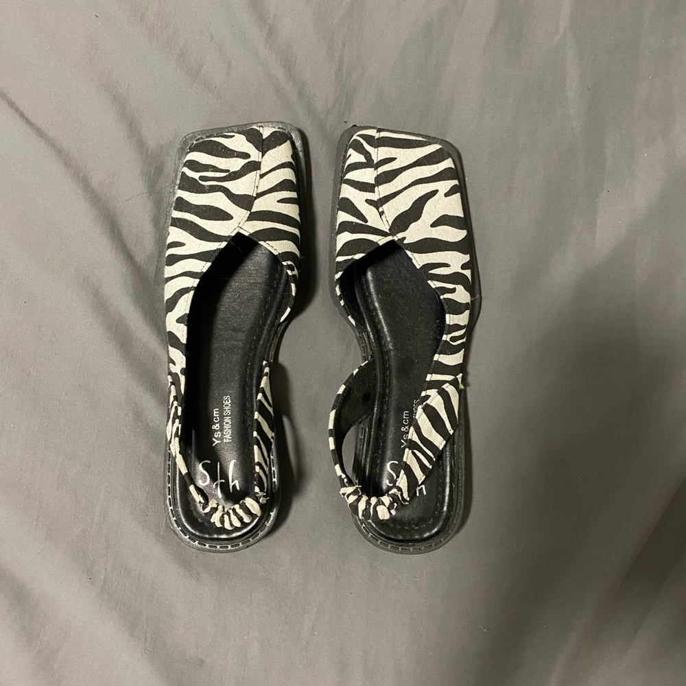 Zebra print flats.